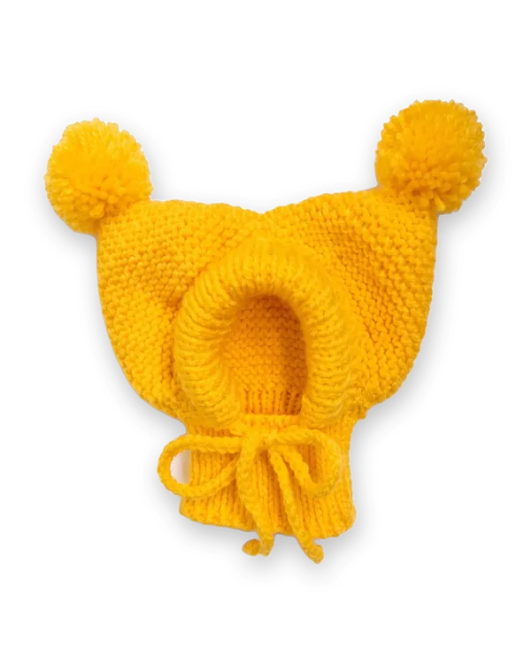 Yellow knitted dog hood with two pom-poms